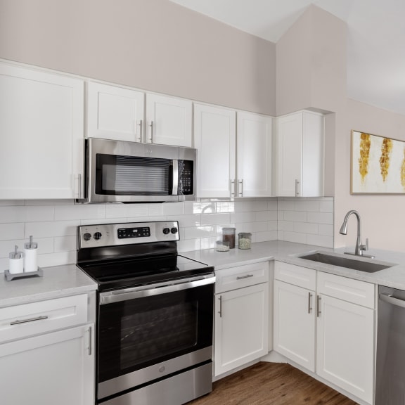 Kitchen with stainless-steel appliances at The Links at Plum Creek in Castle Rock, CO