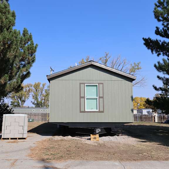the exterior of a tiny house on a trailer at Kimberly Village, Wyoming