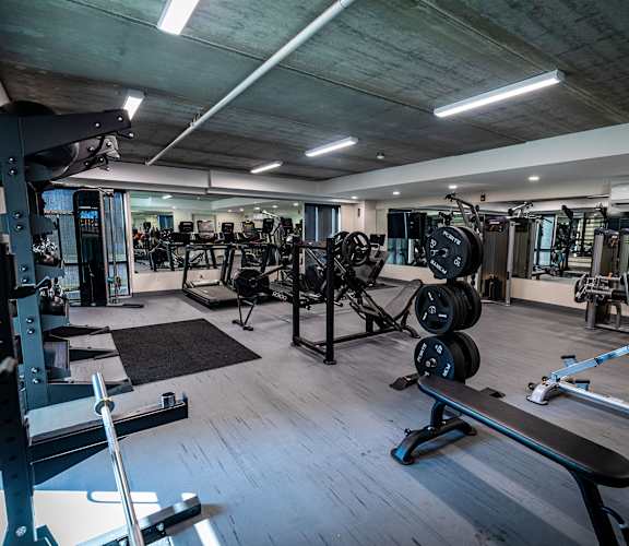 a gym with weights and other exercise equipment