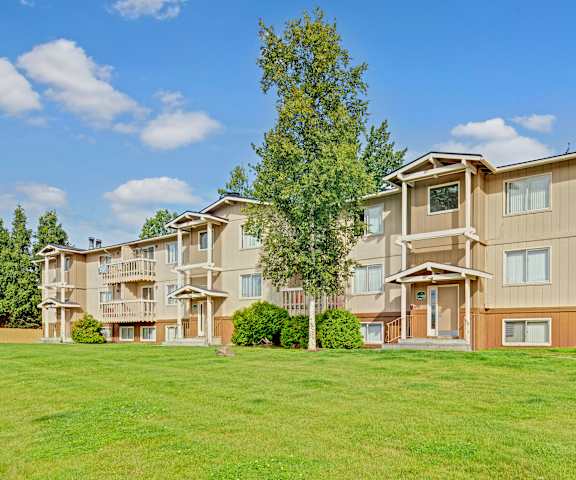 The exterior building of Conifer Grove Apartments. 