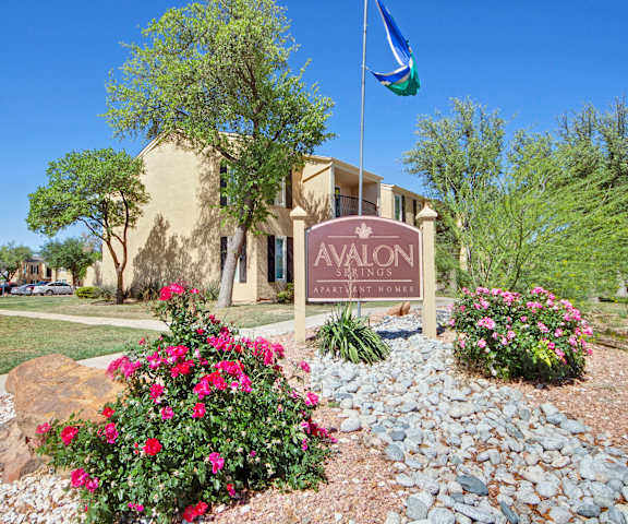 The Avalon Springs sign in front of the building. 