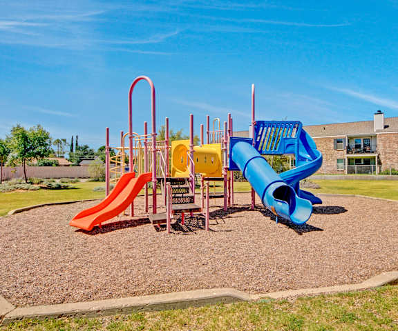 A playground at a park at Cypress Pointe Apartments. 