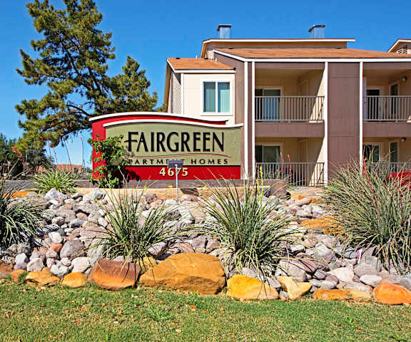 The exterior sign and building of Fairgreen Apartment Homes. 