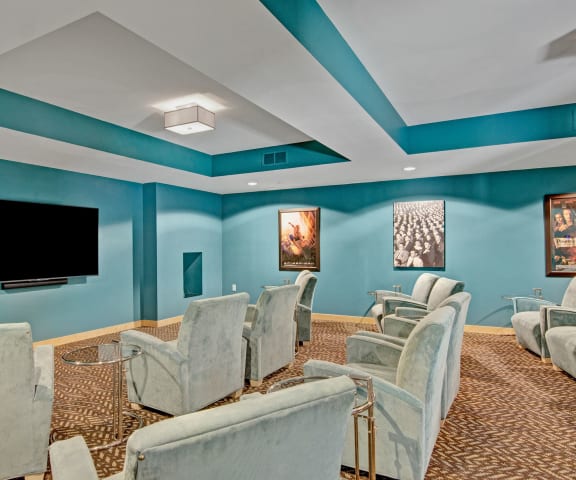 Covington Media Room With TV and Lounge Chairs