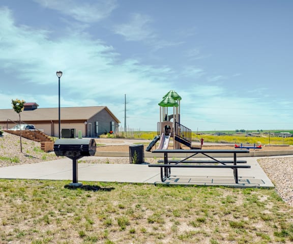 Tons of amenities including Picnic area and Playground Dakota Ridge Playground Apartments for Rent with outdoor playground Williston, ND