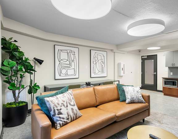 a living room with a couch and a table