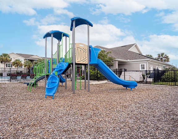 our playground is equipped with a large playset with slides