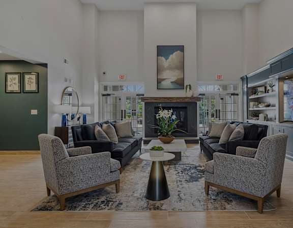 Resident clubhouse lounge with fireplace - Avenel at Montgomery Square