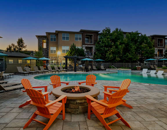 Poolside fire pit lounge - Acadia at Cornerstar Apartments