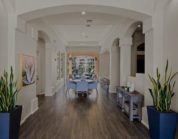Ample social areas in Arrowhead Landing Apartments clubhouse - Arrowhead Landing Apartments