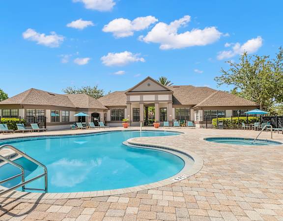 Resort-style swimmign pool with heated spa - Delano at Cypress Creek