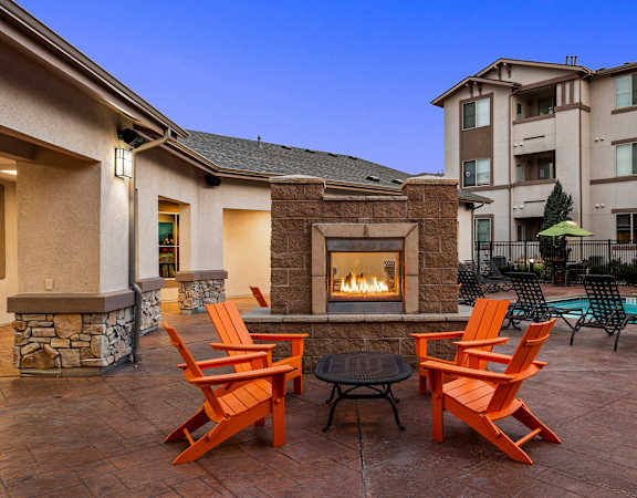 Poolside fireplace lounge - First and Main Apartments