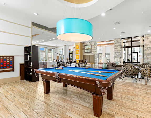 Billiards table in resident clubhouse - Nona Park Village Apartments