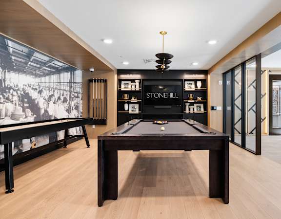 Game room with billiards table - Stonehill at West Orange