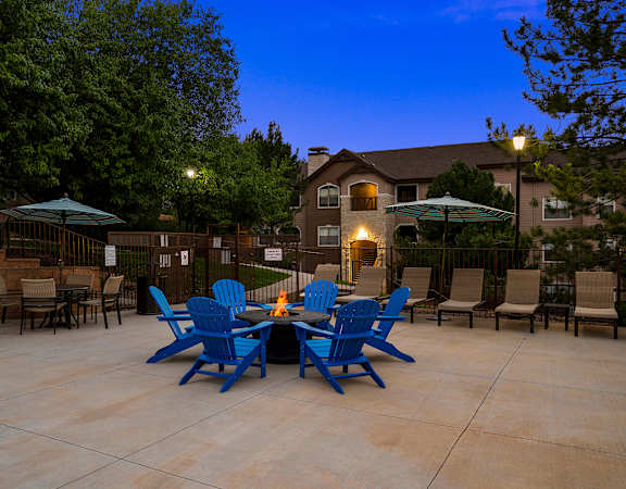 Fire pit lounge area - Grand Centennial Apartments