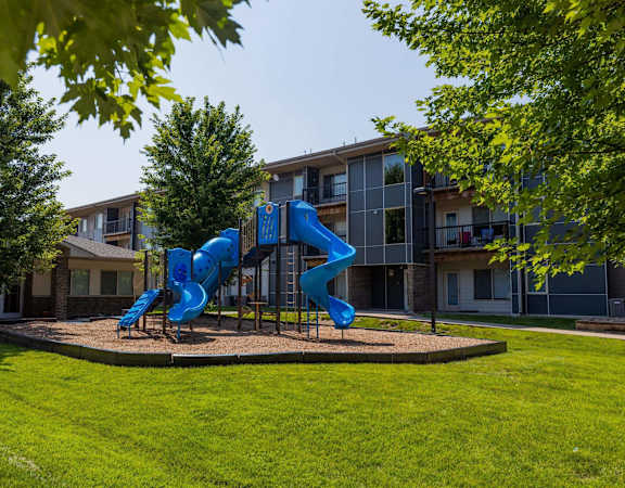 A Blue Slide in a Playground at Capitol Grove Apartments, Des Moines, IA, 50317