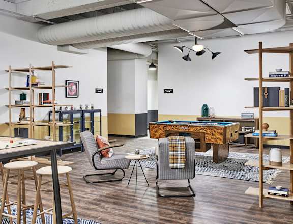 The Edison apartments game room with billiards