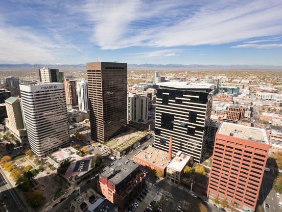 a view of the city from the top of a skyscraper at Apartments at Denver Place, Denver