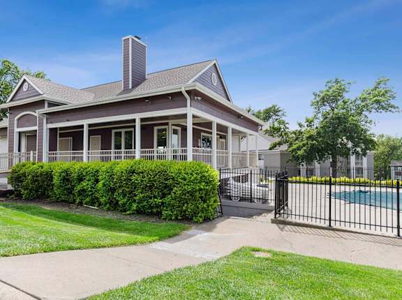 A house with a pool in the backyard.