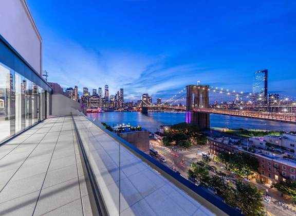 A view of the Brooklyn Bridge from a high-rise building.