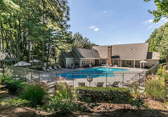 a picture of a building with two dogs in front of it at Gwinnett Pointe in GA 30093