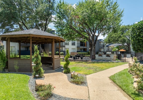 a living room with a couch and a table at District 2308, Texas, 76011