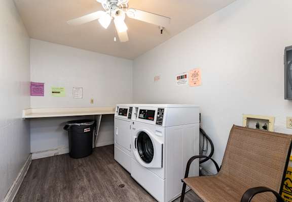 Laundry room with a washer and dryer at Whispering Fountains Whittier, California