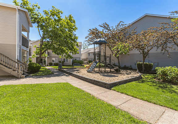 A sunny day at a residential area with a playground.