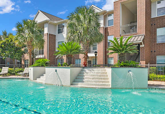 Outdoor Resort Style Pool at Madison on the Meadow Apartments in Stafford, TX 77477