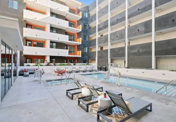 Comfortable Lounge chairs near the pool at Sora Apartments, Inglewood