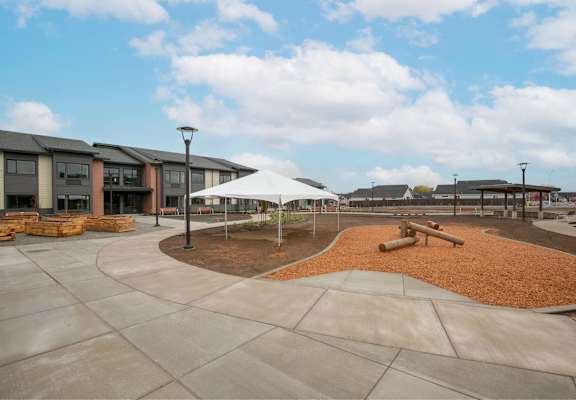 Playground area at Bridge Meadows Redmond Apartments, Redmond, OR, 97756