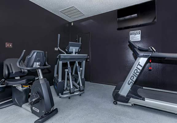 the gym has plenty of exercise equipment in it at The Davis Apartments, Huntsville, 35816