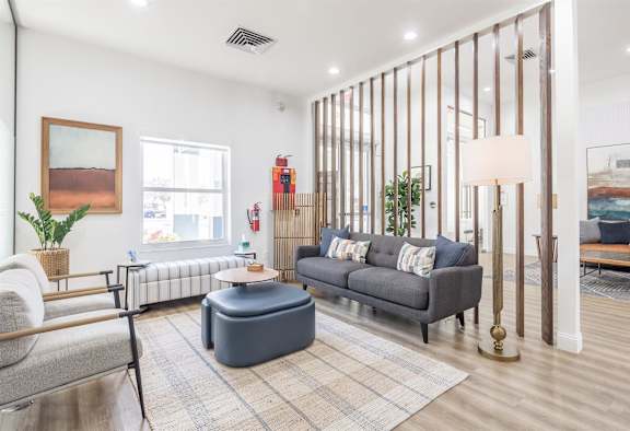 a living room with a couch and a table