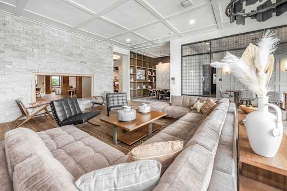 A Living Room with Couches at The Haven at Lake Britt Apartments, Winter Garden, 34787