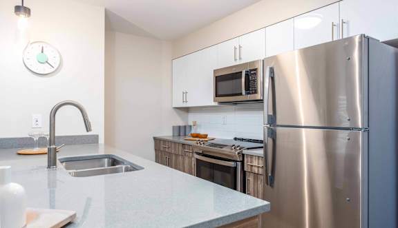 Sink With Faucet at G17 Apartments at Tamarack, Edmonton, AB