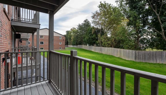 Two female roommates hanging out on couch. at Greenwood Commons, Worcester, 01607