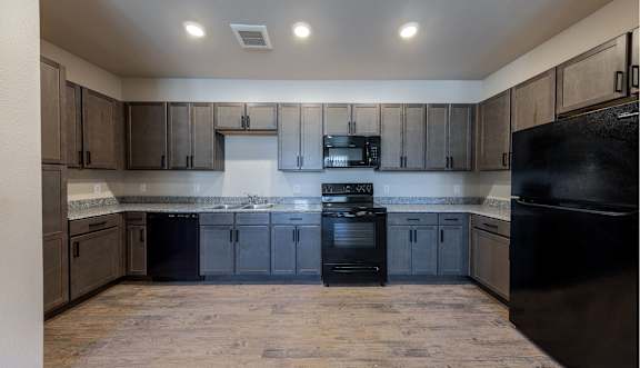 kitchen with brown cabinets at Springview by Vintage, Reno, NV