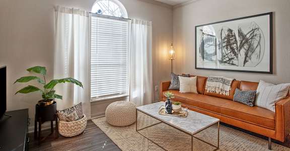 a living room with a couch and a coffee table at Volare at the Woodlands, The Woodlands, TX