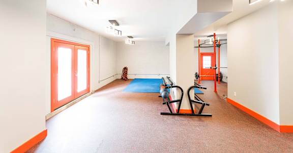 Fitness Center With Yoga/Stretch Area at Encore 99, East Haven, CT