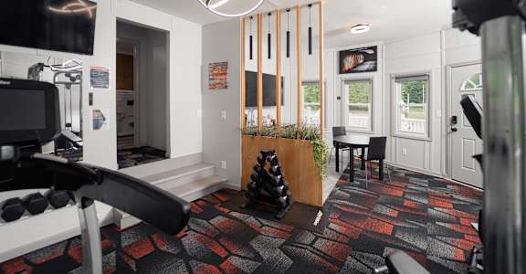 a living room that has a gym and a dining area with a table and chairs at Woodbury, Woodbury, CT, 06798