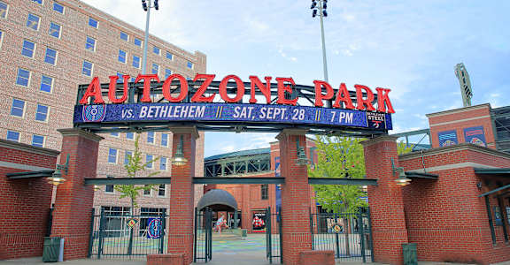 The entrance to the AutoZone Park with a sign that reads