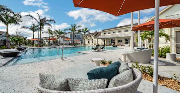Outdoor space by the swimming pool at The Boardwalk at Tradition, Port St Lucie