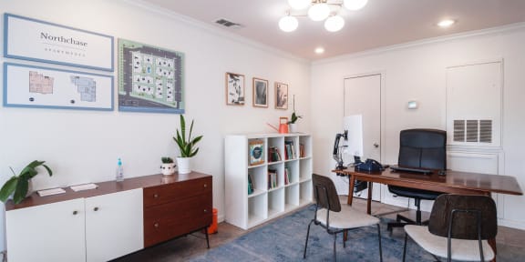 a home office with a desk and a chair and a computer at Northchase, Texas, 78753