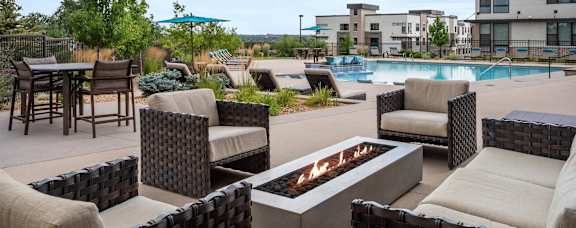 Gateway Arvada Ridge Outdoor Courtyard with Pool, Fireplace, and Seating Areas