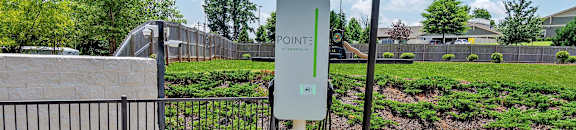 Electric charging station at POINTE AT GREENVILLE APARTMENTS, GREENVILLE