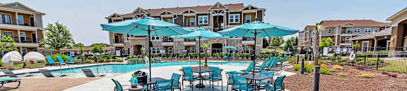 Poolside patio at POINTE AT GREENVILLE APARTMENTS, GREENVILLE, South Carolina