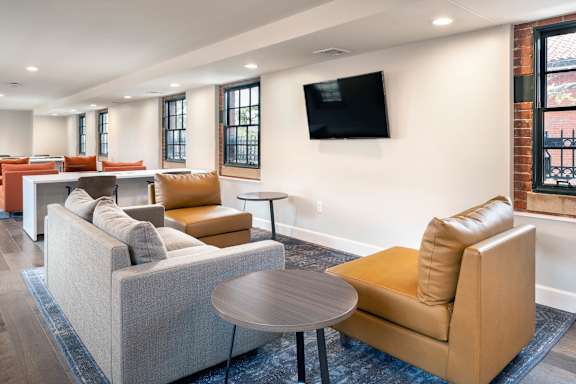 Community Room With TV at The Residences at St. Elizabeths East, Washington, 20032