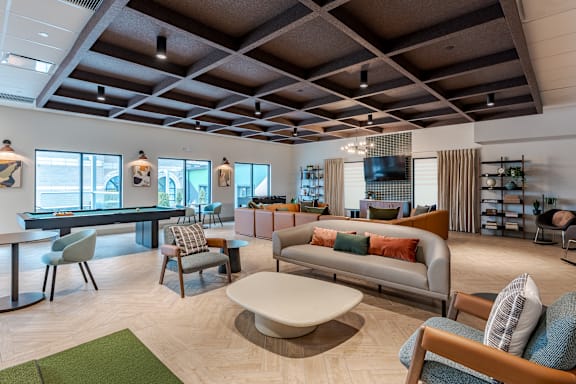 a gym with weights and exercise equipment at the flats  at 15 Bank Apartments, White Plains, NY