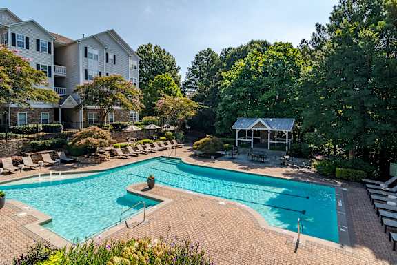 Pool With Relaxing Chairs at Willowest in Vinings, Georgia, 30339