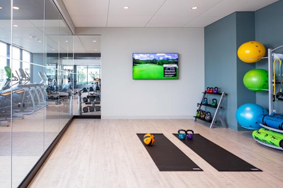 Gym with exercise equipment and a TV screen at 365 Nicollet, Minneapolis, MN, Manchester , 55401